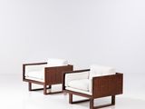 une paire de chaises longues dans le style de [nom de personne]