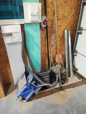 an image of a room with a refrigerator and other appliances