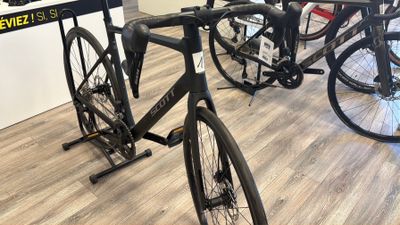 a bike that is sitting on a stand in a store