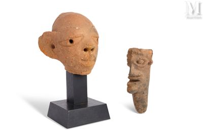 une image représentant une statue d'un homme et une petite statue d'une femme