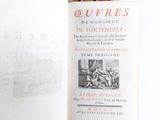 an open book with a picture of a man on it