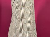 an image of a suit on a mannequin stand