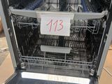 a dishwasher that has a lot of dishes in it