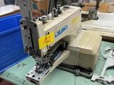 a sewing machine that is sitting on a table
