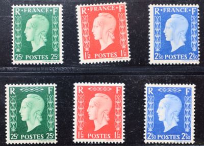 quatre timbres de couleurs différentes sur lesquels figurent des portraits d'hommes
