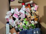 a cardboard box filled with lots of food and drinks