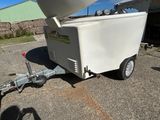 a small trailer with a boat on the back of it