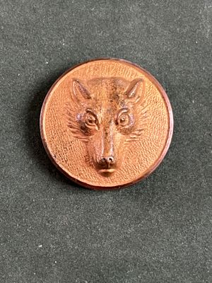 une image représentant une pièce de monnaie sur laquelle figure un loup