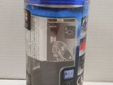 a can of soda that is sitting on a table