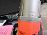 a drill that is sitting on top of a table