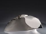a silver object that is sitting on a table