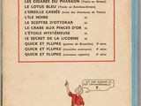an old french book with a cartoon of a man holding a cat