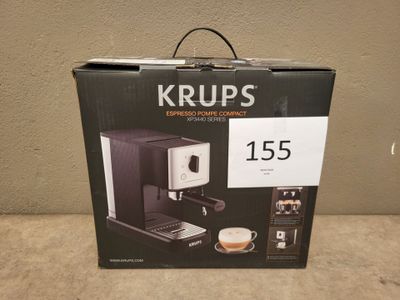 une boîte contenant une machine à café