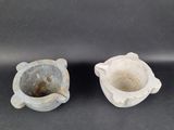 pair of ancient roman glass ashtrays in the shape of a cat and a fish
