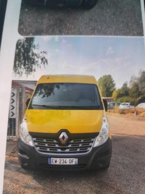 a picture of a yellow van parked in a parking lot