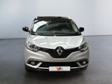 the front view of a white car in a showroom