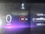 a picture of a car dashboard showing the speed of the car