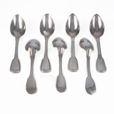 six spoons and two spoon spoons on a white surface