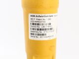a close up of a yellow cup with a sticker on it
