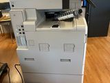 a printer that is sitting on top of a desk