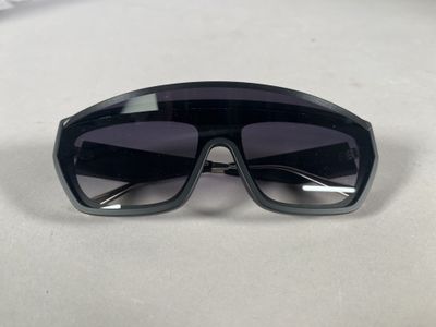 a close up of a pair of sunglasses on a table
