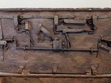 an old wooden trunk with metal latches on it