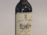 a bottle of wine that is sitting on a table
