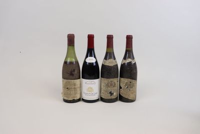 trois bouteilles de vin posées l'une à côté de l'autre sur une table