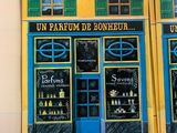 a picture of a postcard of a store front