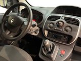 dashboard of a small car with a steering wheel and dashboard controls