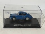 a small blue car in a clear display case