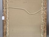 an old picture frame with a rope hanging from it ' s side