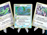 Trois cartes Pokémon sont représentées en ligne sur un fond noir