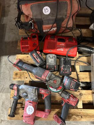 many tools that are sitting on a pallet on the floor