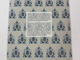 the back cover of a book with a blue and white pattern on it