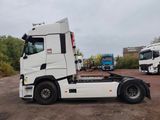 a white truck that is parked in a lot