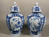 pair of chinese blue and white vases with lids