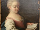 portrait d'une femme en train de lire un livre dans un tableau