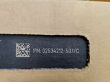 someone is holding a brown box with a qr code on it