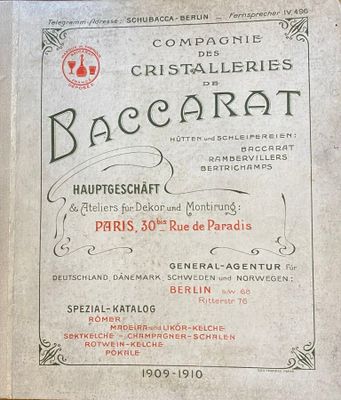 an old book that is on display on the table
