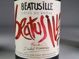 a bottle of wine that is sitting on a table