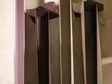 four pieces of metal that are sitting on a table