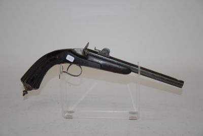 an old gun on display on a clear acrylic stand