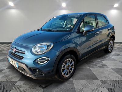 a blue fiat suv parked on a checkered floor in a garage