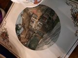 a plate that has a picture of a building on it