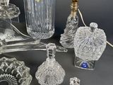 a lot of glass items that are on the table