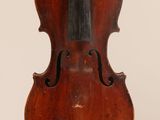 an old violin with a bow on a white background