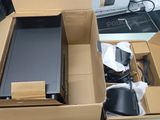 a box with a computer inside of it on a table