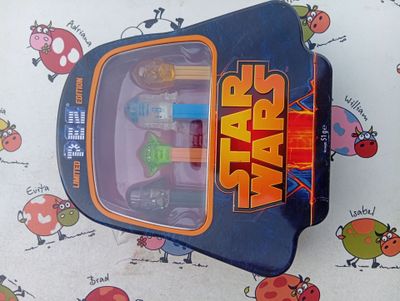 a star wars toy in the box on the table