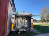 a truck that is parked in front of a building
